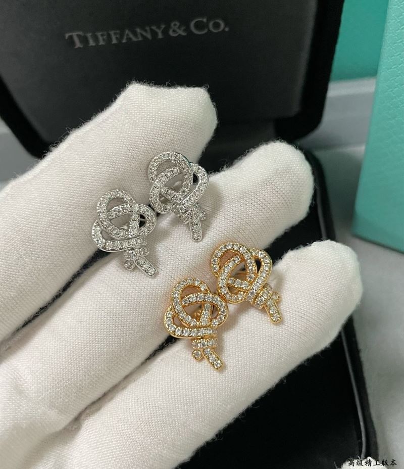 T*f*ny earrings
